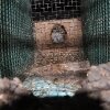 Avföring ansamlas i buren